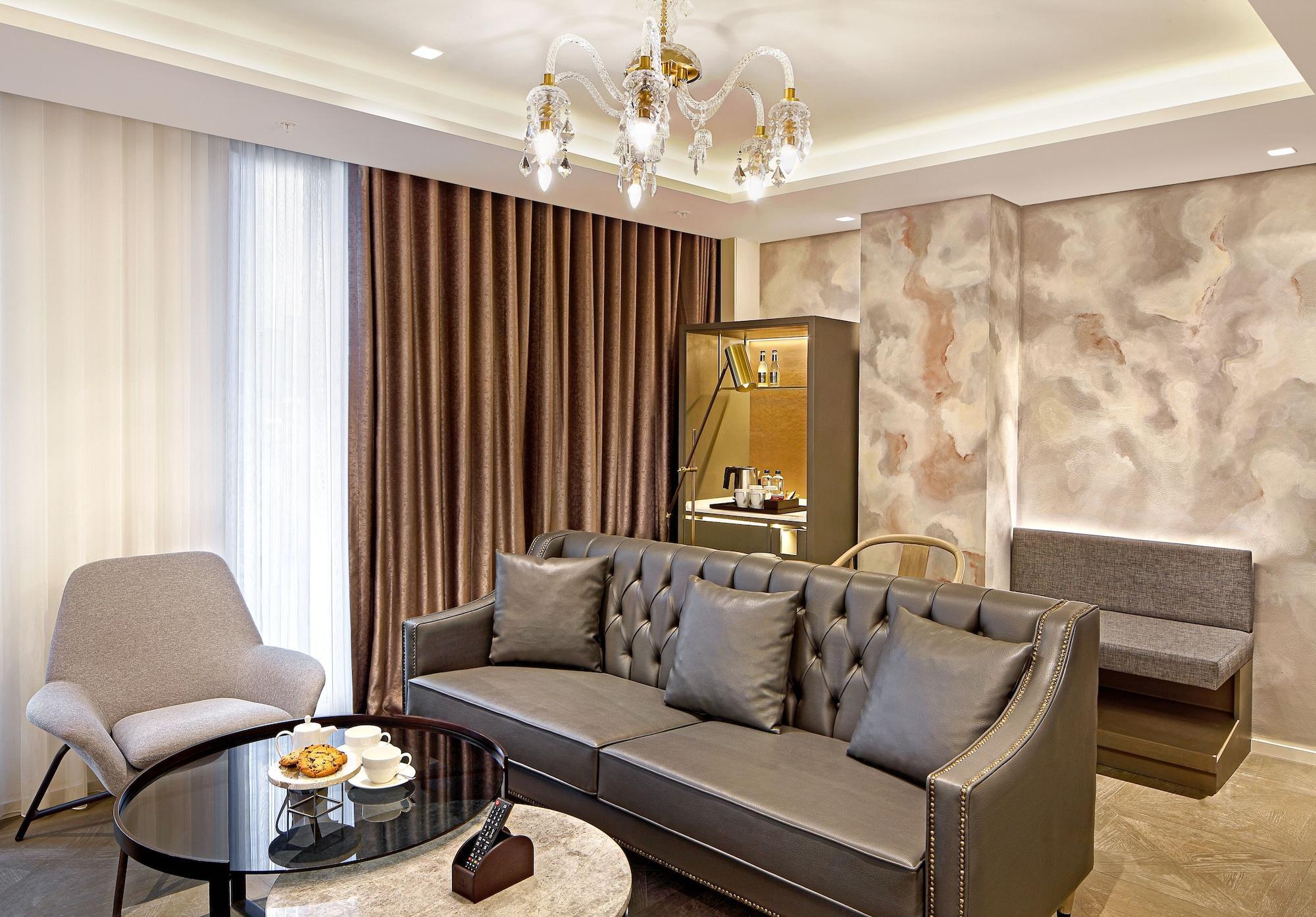 ホテル Wanda Vista イスタンブール エクステリア 写真 A living room in a suite at the hotel